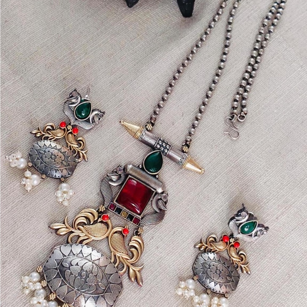 Elegant Silver and Gold Necklace Set with Red and Green Accents